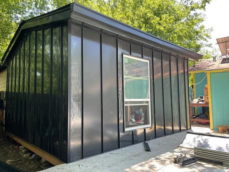 Black standing seam metal wall panels for Roof Inspection in Kinston